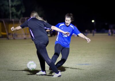 2 mums playing football