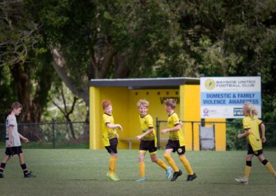 boys laughing on the football field