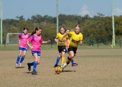 girls playing football