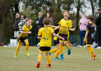 kids having fun on football field