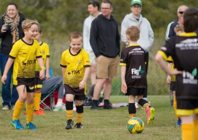 kids laughing on football field